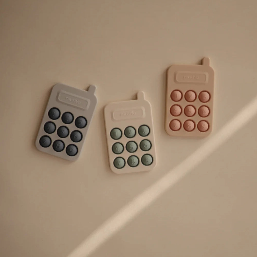 Mushie Jouet de Presse Téléphonique - Blush