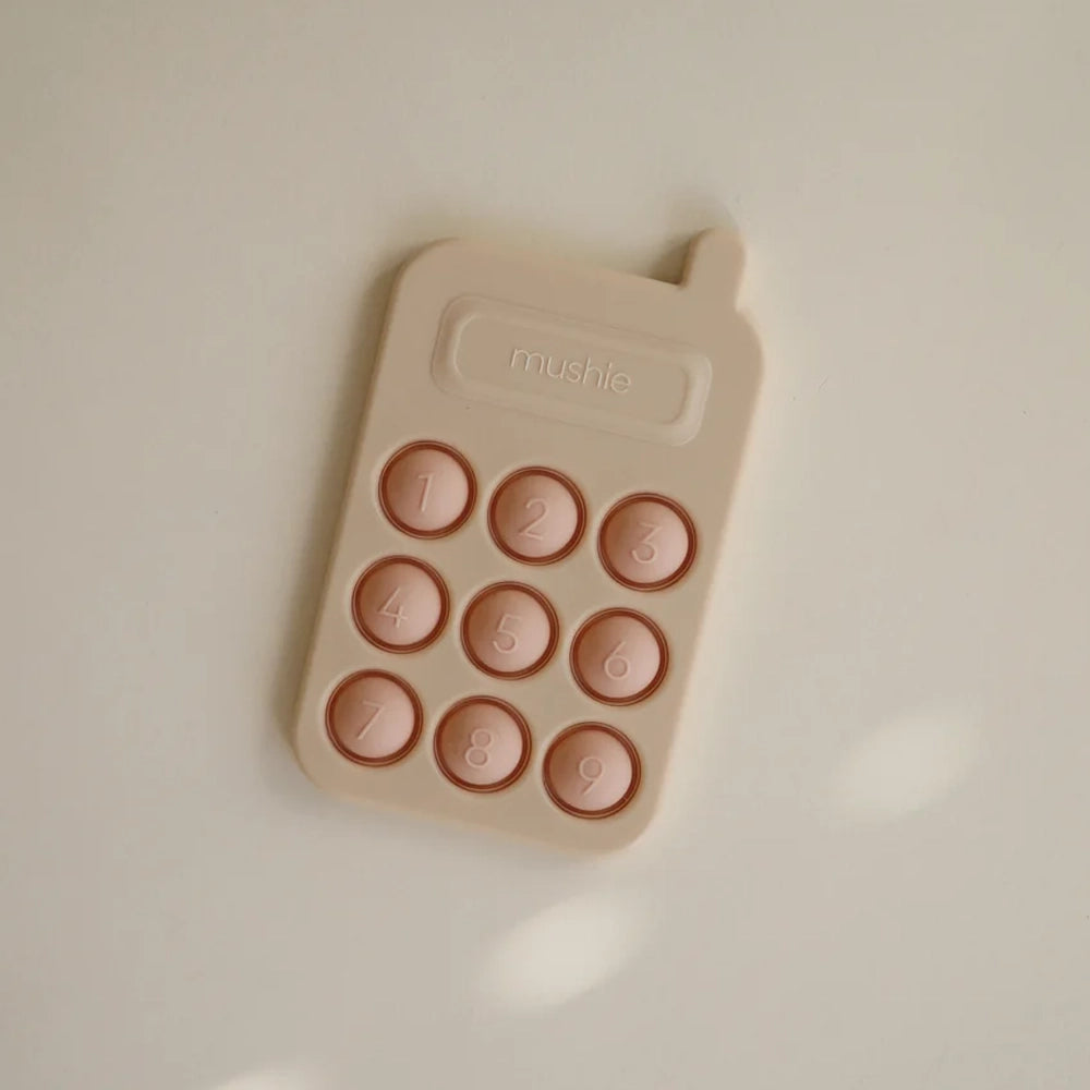 Mushie Jouet de Presse Téléphonique - Blush