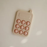Mushie Jouet de Presse Téléphonique - Blush